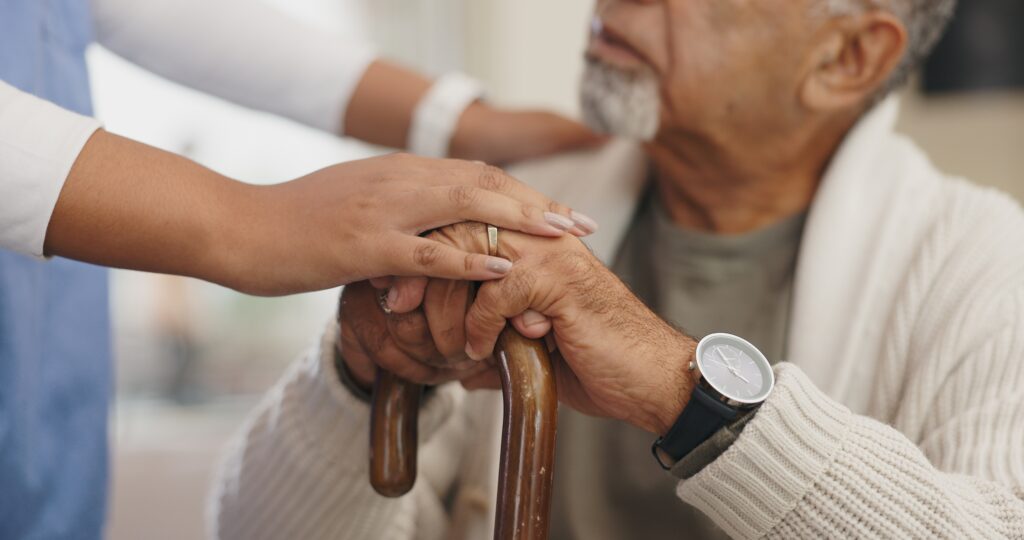 Senior Care Support Or Hands Of Caregiver With Person For