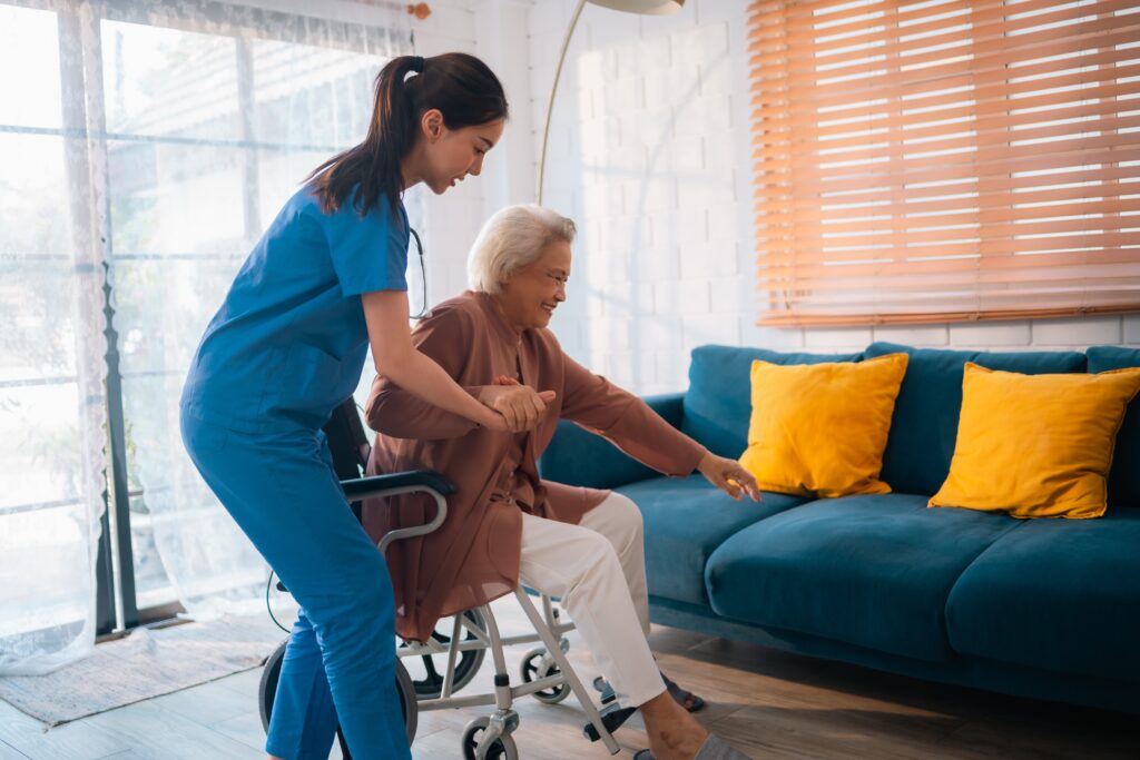 Dedicated Caregiver Woman Nurse Provides Supportive Health Care For Elderly